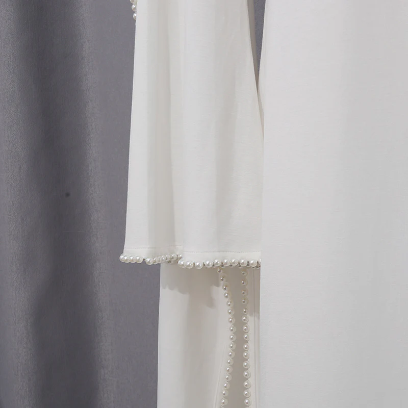 White Jersey Abaya with Matching Decorative Pearl Strip - Image 6